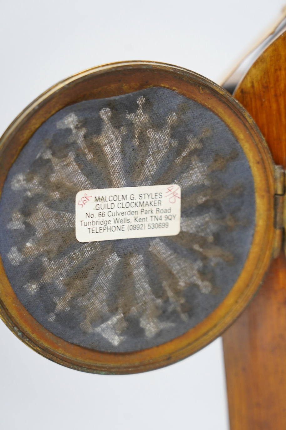 A 19th century mahogany eight day mantel clock with enamel dial and pendulum, 30cm high. Condition - fair, not tested